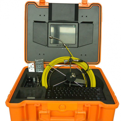 Image of pipe inspection camera system by VICAM MECHATRONICS featuring model V8-1088DK with rod & reel, camera head, control station, keyboard & remotes all together in rugged carrying case.